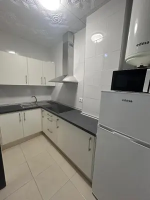 Una cocina o zona de cocina en Apartamento Europa con terraza