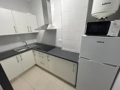 Una cocina o zona de cocina en Apartamento Europa con terraza