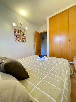Cama o camas de una habitación en Casa con piscina Sant Pol de Mar