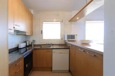 Una cocina o zona de cocina en LETS HOLIDAYS Pool and sea views apartment with 1 parking space