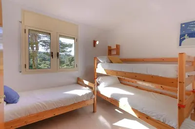 Cama o camas de una habitación en LETS HOLIDAYS Pool and sea views apartment with 1 parking space