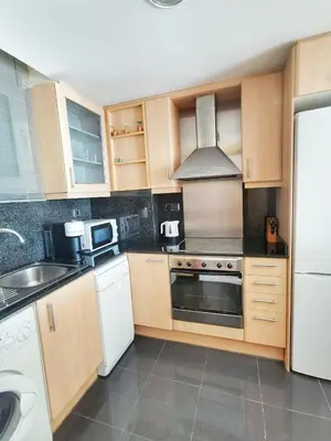Una cocina o zona de cocina en Seafront apartment in Blanes S'Abanell Central Park