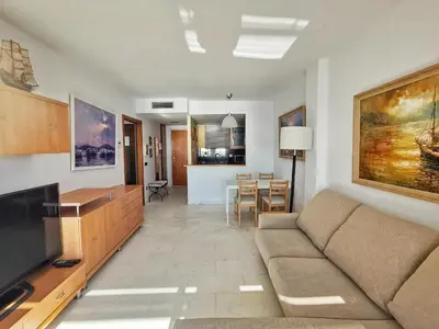 Una televisión o centro de entretenimiento en Seafront apartment in Blanes S'Abanell Central Park
