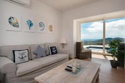 Zona de estar de Leng Vacation Home