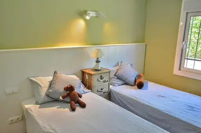 Cama o camas de una habitación en Leng Vacation Home
