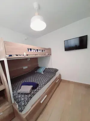 Cama o camas de una habitación en Gran piso en Puerto deportivo Marina Palamós IDEAL FAMILIAS