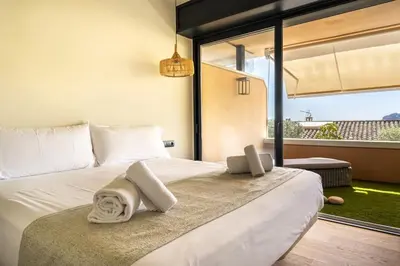 Cama o camas de una habitación en Alta House Apartments Sa Blava