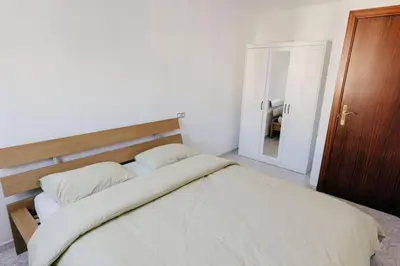 Cama o camas de una habitación en 2 Bedroom Apartment Lloret de Mar Terrace & Pool