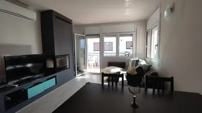 Una televisión o centro de entretenimiento en VILLAS COSETTE Apartamento Ponent