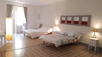Cama o camas de una habitación en Casa rural El refugi platja d'aro 4