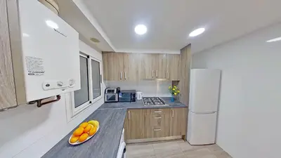 Una cocina o zona de cocina en PREMIUM HABITAT LA RIERA