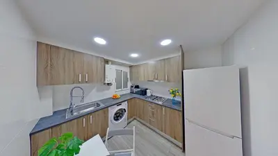Una cocina o zona de cocina en PREMIUM HABITAT LA RIERA