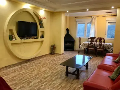 Una televisión o centro de entretenimiento en Apartamento duplex Begur(costa brava)
