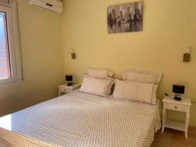 Cama o camas de una habitación en Casa Bosc (Residencial Begur)