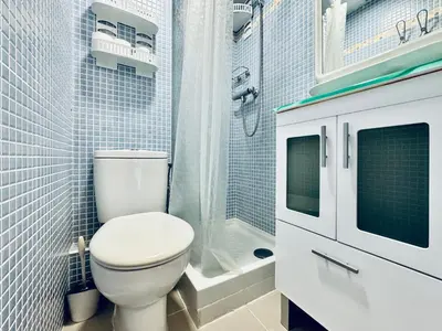 Un baño de Hauzify I Apartaments Palace