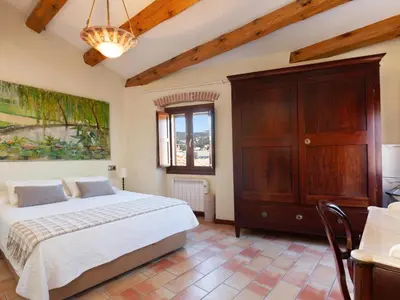Cama o camas de una habitación en LETS HOLIDAYS NICE HOUSE in VILA VELLA TOSSA DE MAR