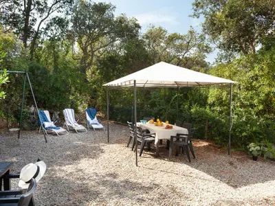 Jardín al aire libre en LETS HOLIDAYS BEAUTIFUL HOUSE in TOSSA