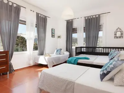 Cama o camas de una habitación en LETS HOLIDAYS BEAUTIFUL HOUSE in TOSSA