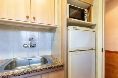 Una cocina o zona de cocina en Isard 7 Apartamento junto a la playa