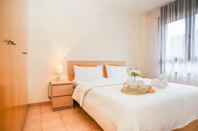 Cama o camas de una habitación en AL37 Precioso apartamento playa Fenals