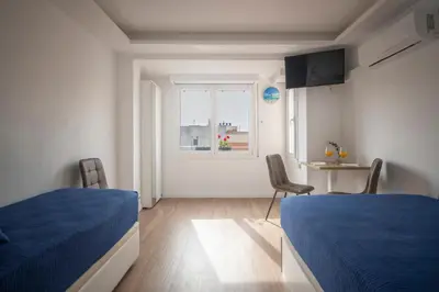 Cama o camas de una habitación en Ático en Calella a 7 minutos de la playa