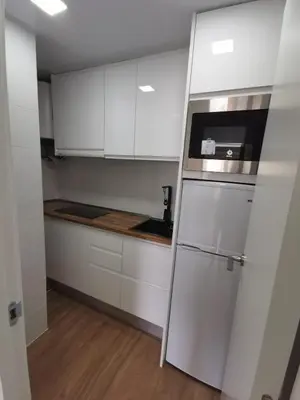 Una cocina o zona de cocina en Ático en Calella a 7 minutos de la playa