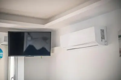 Una televisión o centro de entretenimiento en Ático en Calella a 7 minutos de la playa