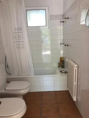 Un baño de FAMILY Homefromhomees
