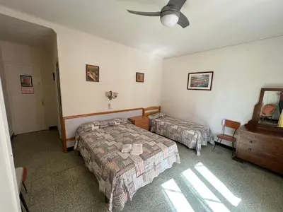 Cama o camas de una habitación en Hostal Zurich