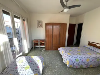 Cama o camas de una habitación en Hostal Zurich