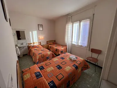 Cama o camas de una habitación en Hostal Zurich
