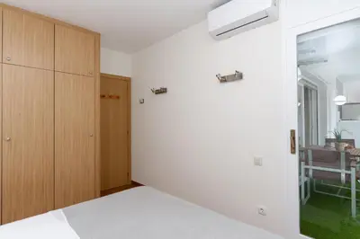 Cama o camas de una habitación en Alva Park Sunny apartment near the beach